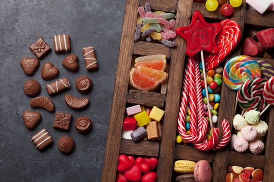 A vibrant assortment of chocolates, hard candies, sour candies, and other goodies